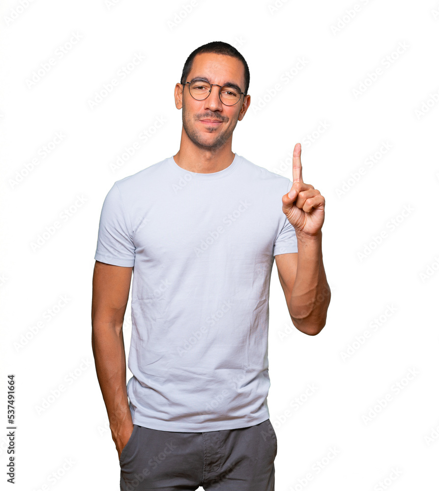 Young man making a number one gesture Young man making a number one gesture