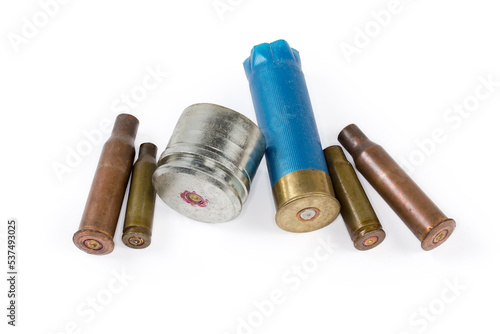 Spent shells different calibers from firearms on a white background