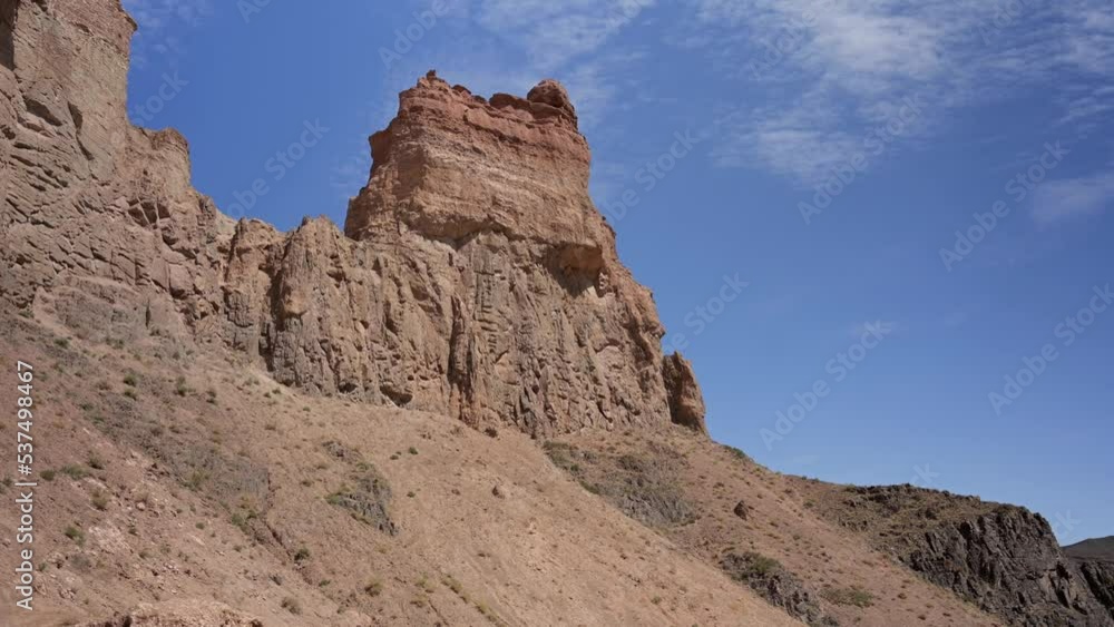 Scenic rock formations and jagged cliffs of Charyn Canyon, Kazakhstan Scenic rock formations and jagged cliffs of Charyn Canyon, Kazakhstan