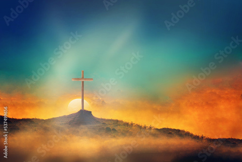 Fototapeta Shining cross on Calvary hill, sunrise, sunset sky background