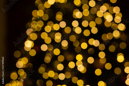 Festive Christmas tree yellow light holiday background