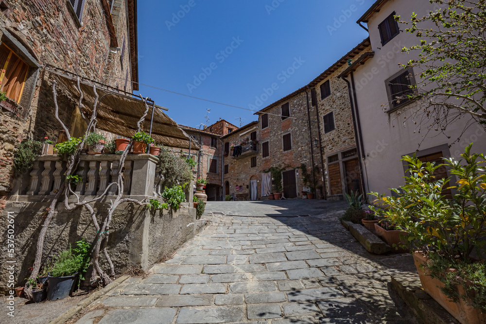 Walking narrow stone streets of old small mountain town. Ambra, Bucine, Arezzo, Tuscany, Italy