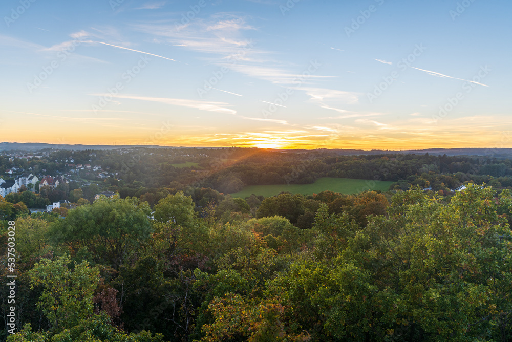 Last sunlight above Syratal from Lookout tower on Barenstein hill in Plauen city in Germany