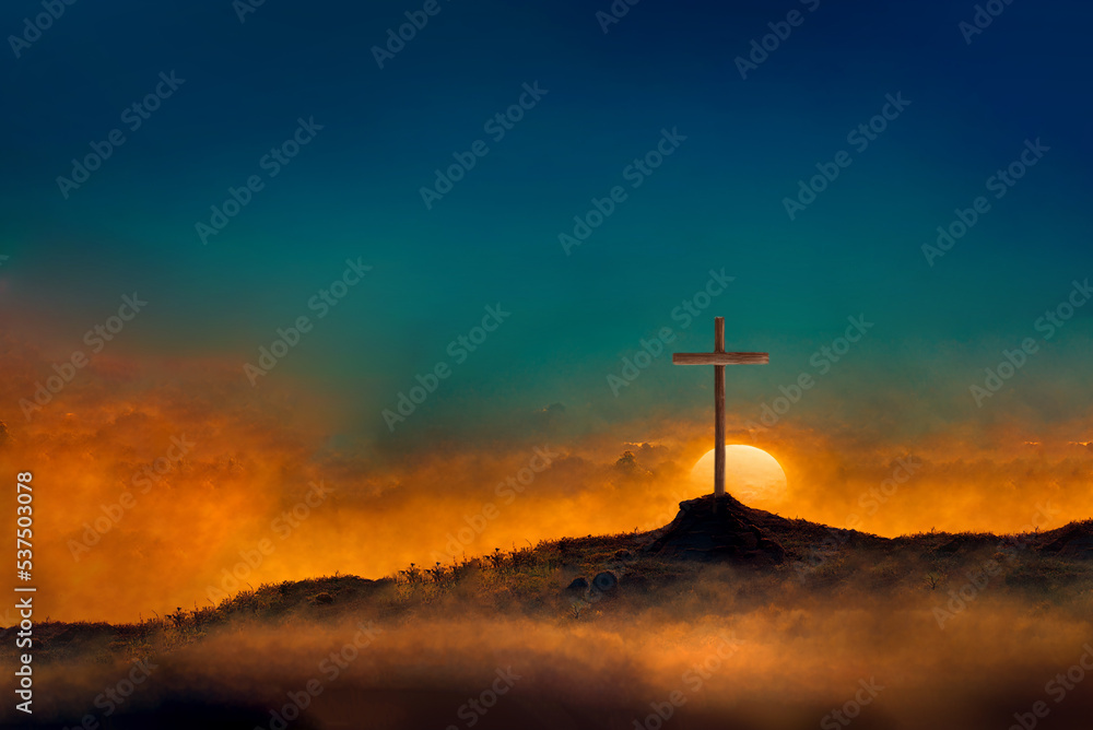Obraz premium Silhouette of christian cross on mountain hill background. Copy space. Faith symbol. Church worship, salvation concept. Faith symbol in Jesus Christ. Holy cross for Easter day. Christianity