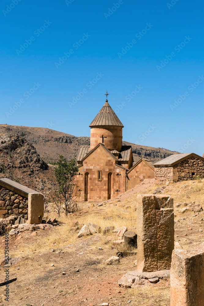 Armenia, Noravank, September 2022. View of the old temple and the reverse side of the khachkars. Armenia, Noravank, September 2022. View of the old temple and the reverse side of the khachkars.