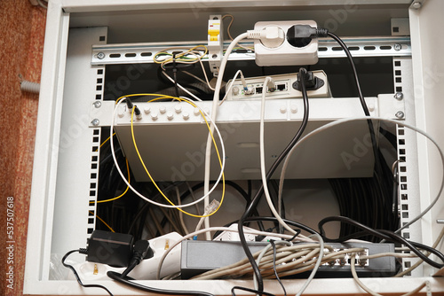 Obraz na plátně Network computer cables connected to a router or modem in the office