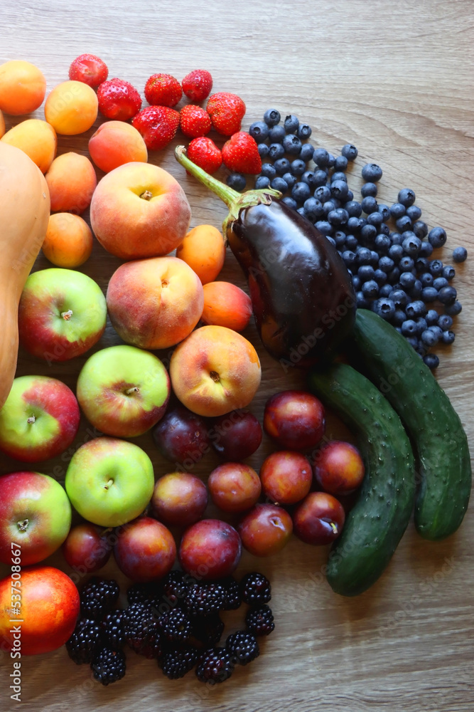 Various healthy fresh fruit and vegetable on wooden table. Top view. Various healthy fresh fruit and vegetable on wooden table. Top view.