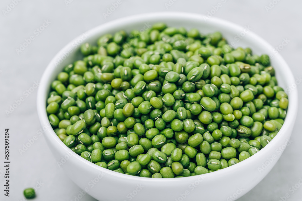 Green Gram. Organic Mung Beans in bowl on gray stone background. Green Gram. Organic Mung Beans in bowl on gray stone background.