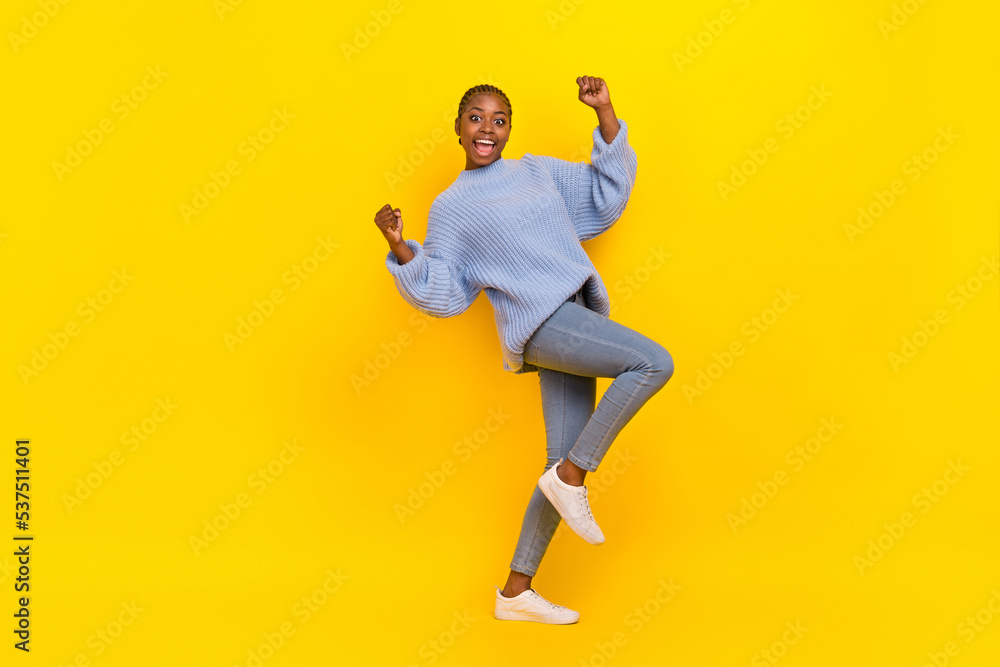 Full size photo of young girl celebrates victory quiz first place isolated on bright yellow color background
