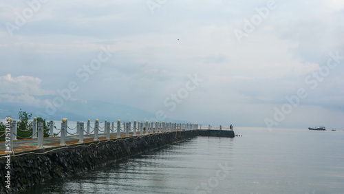 an amazing pier on manado beach © 42L