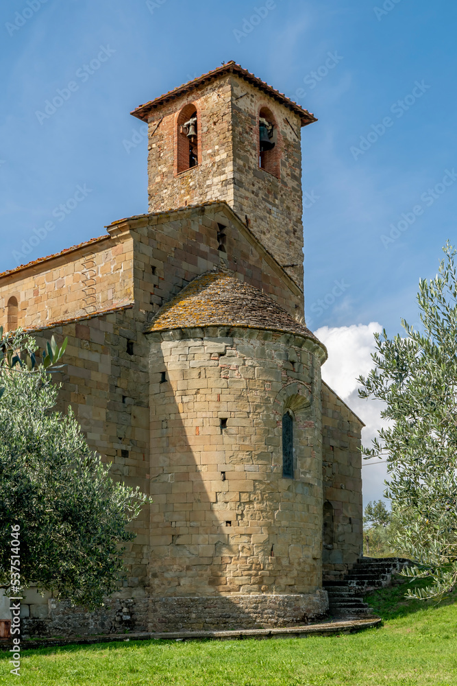 The apse of the Parish church of San Romolo a Gaville, Figline and Incisa Valdarno, Florence, Italy, framed by olive trees