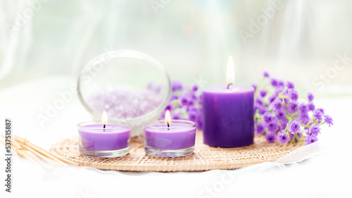 Spa beauty massage health wellness background.  Spa Thai therapy treatment aromatherapy for body woman with purple flower nature candle for relax and summer time. Copy space and banner