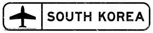 Grunge black south korea word with plane icon square rubber seal stamp on white background