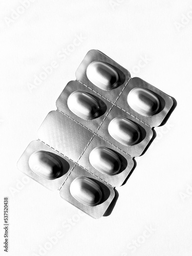 pills on a white background flatley. medicine pharmaceuticals