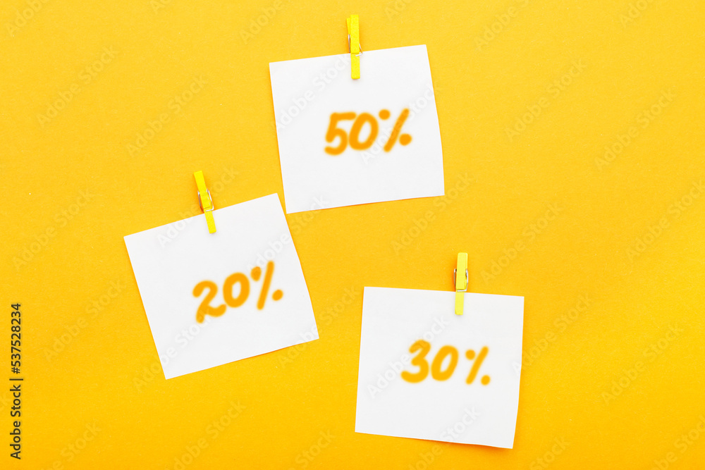 discount paper stickers on an orange background discount paper stickers on an orange background