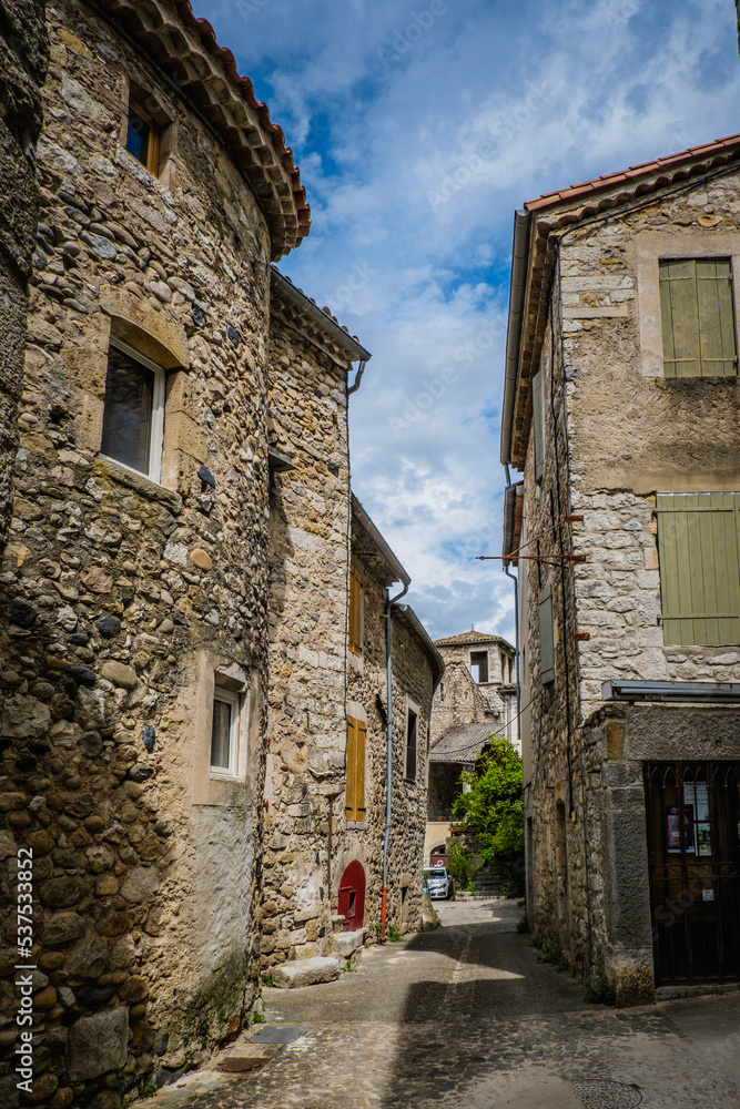 the narrow streets of the medieval village of Vogue, in the South of France (Ardeche) the narrow streets of the medieval village of Vogue, in the South of France (Ardeche)