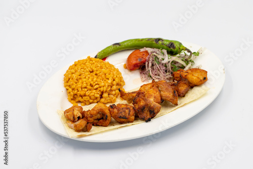 Grilled chicken skewers isolated on white background. Turkish foods. close up