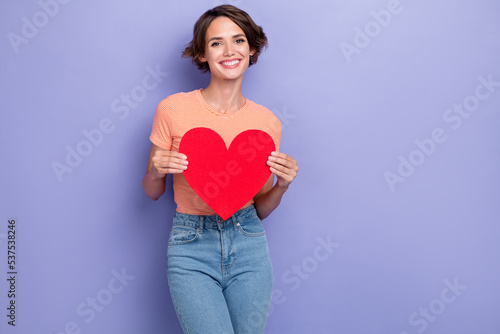 Photo of nice looking lady stylish outfit hand hold big red heart preparing holiday weeding day decor isolated on purple color background © deagreez