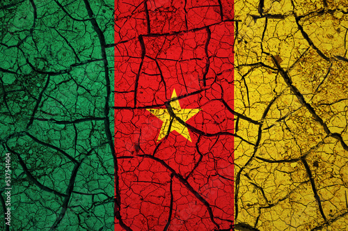 Dry soil pattern on the flag of Cameroon. Country with drought concept. Water problem. Dry cracked earth country.