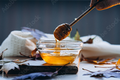 Honey or maple syrup in a bowl. High quality photo	