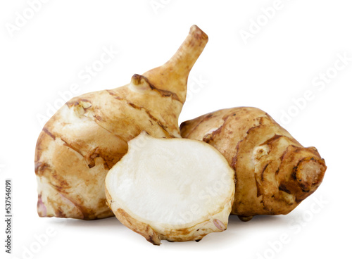 Jerusalem artichoke and half on a white background. Isolated