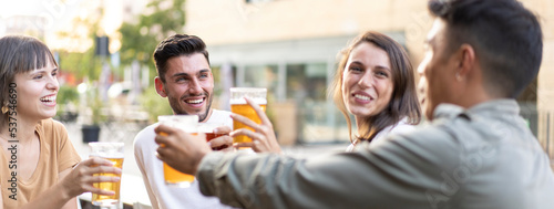 Photography Horizontal banner or header with multiracial friends drinking beer at brewery pu