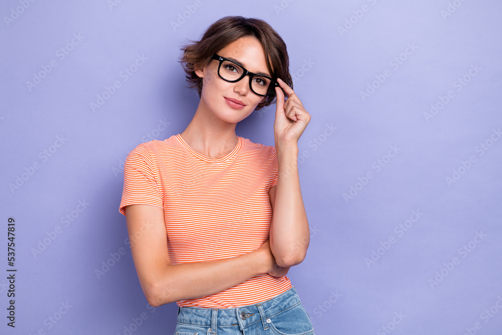 Photo of adorable pretty girl dressed orange t-shirt hand arms spectacles empty space isolated purple color background - obrazy, fototapety, plakaty 