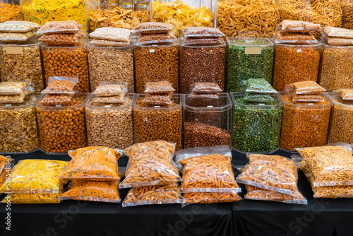 Variety types of Indian snacks selling at the booth.