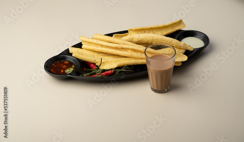 fafda Gathiya (fafda jalebi) is a very popular Gujarati snack, common street snack from India. photo