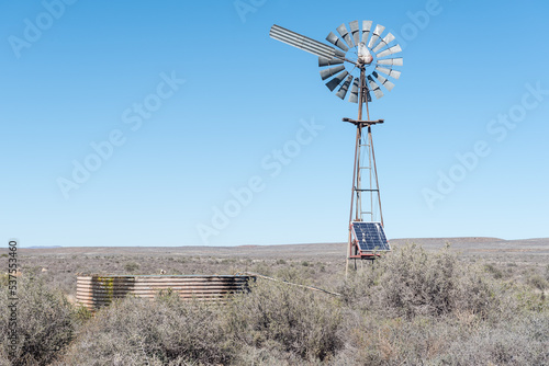 Inoperative windmill, used as solar panel platform photo