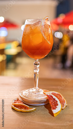 sbagliato cocktail in glass cup with orange slices photo