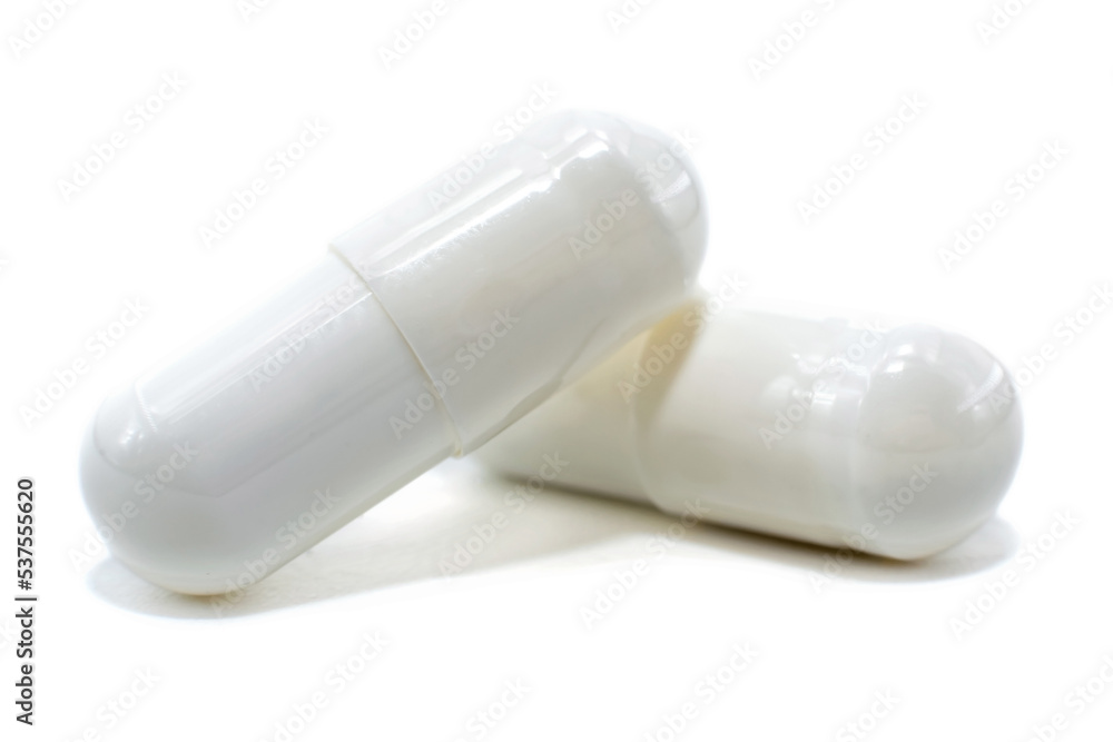 Obraz premium Medical capsules, pills on a white background close-up. Medical drug. Health. Treatment