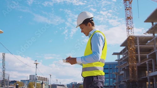 Εκτύπωση καμβά Professional builder standing in front of construction site