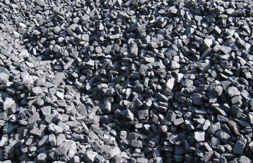 A Stack of Black Lump Coal as a Background Image.