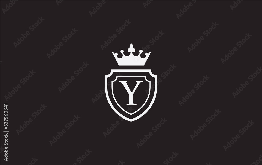 Crown and shield icon and royal luxury symbol. King and queen abstract geometric logo with letters and alphabets Crown and shield icon and royal luxury symbol. King and queen abstract geometric logo with letters and alphabets