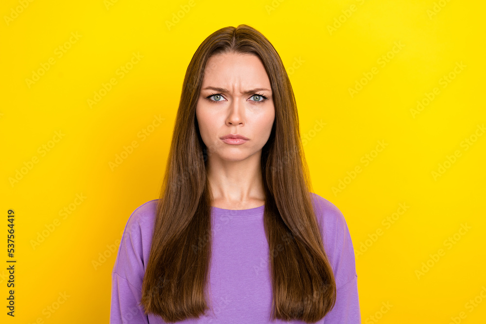 Fototapeta premium Closeup photo unhappy grimace cute woman eyebrows pouted lips serious dont like her new hairstyle after salon advert isolated on yellow color background