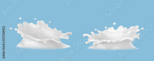 Milk crown splash set isolated on blue background. Vector realistic milk splash.