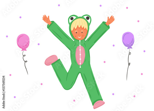 Child in green frog kigurumi pajama. Birthday onesie party