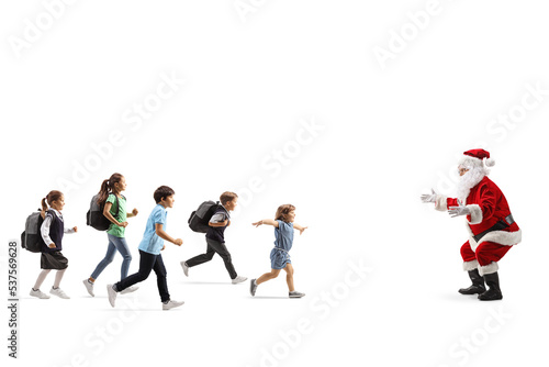 Group of children running towards santa claus