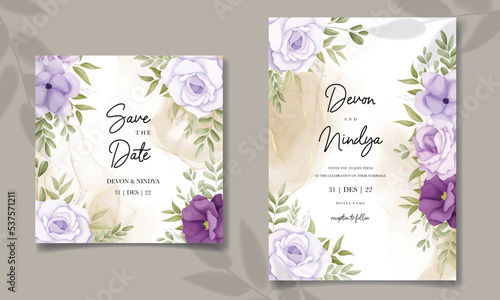 Elegant wedding invitation card with purple flower decoration