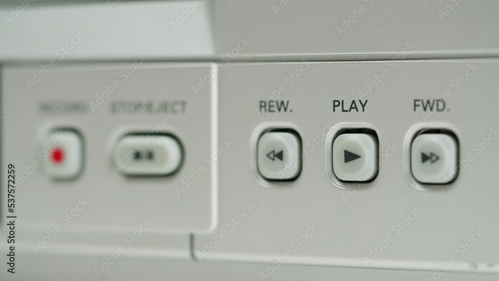 Old video recorder close-up, VHS. Retro player, vintage video cassette broadcasting, audio tape. Old video recorder close-up, VHS. Retro player, vintage video cassette broadcasting, audio tape.