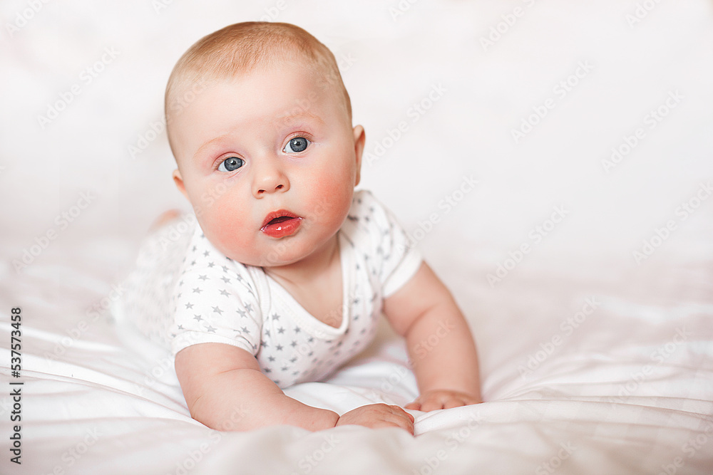 Cute little baby indoors. Lovely infant closeup portrait