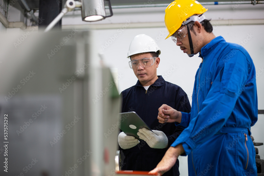 experienced operator technician worker or engineer metalworker industrial in safety helmet working or repair on metal machine, professional maintenance skill man in industry manufacturing. men at work experienced operator technician worker or engineer metalworker industrial in safety helmet working or repair on metal machine, professional maintenance skill man in industry manufacturing. men at work