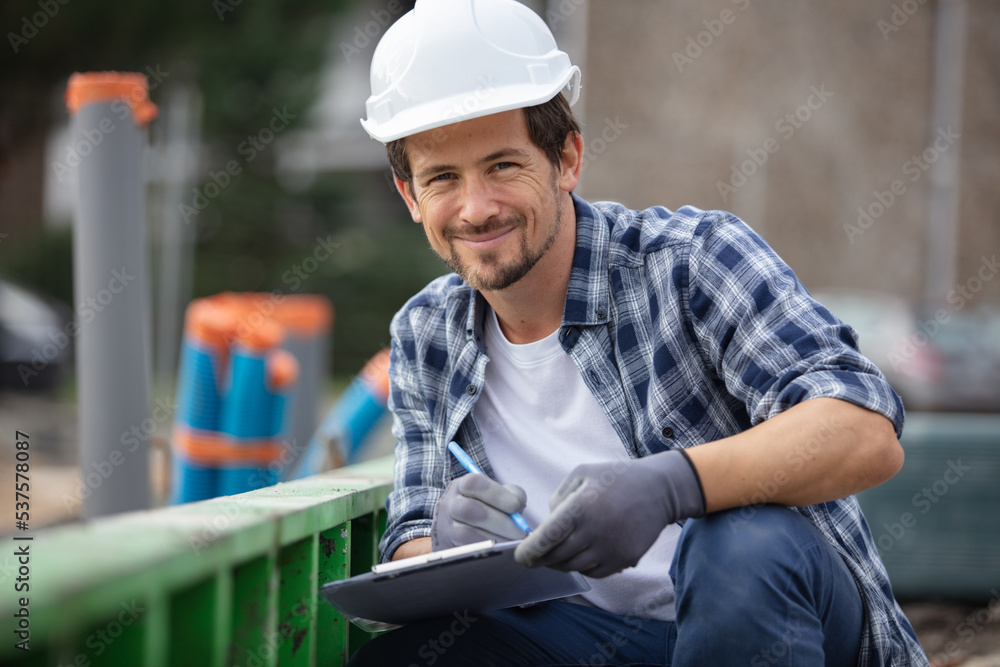 tired construction worker is thinking about perspectives tired construction worker is thinking about perspectives