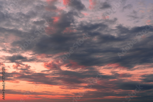 Twilight sky with effect of light pastel tone. Colorful clouds on the dramatic sunset sky