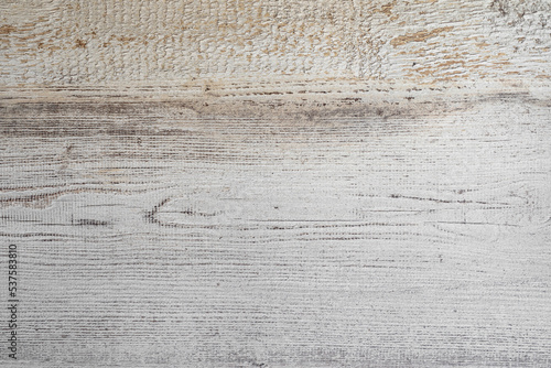 Rustic melamine wood plank in natural colors and marked grains. Wood background graphic resource.