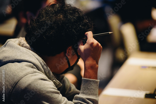 People thinking in conference hall at business event