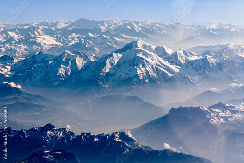 Mountain view from an airplane window © EwaStudio