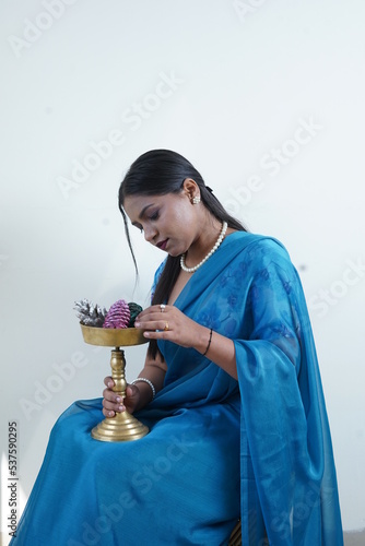 dusky girl wearing blue saari photo