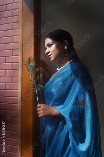 dusky girl wearing blue saari photo